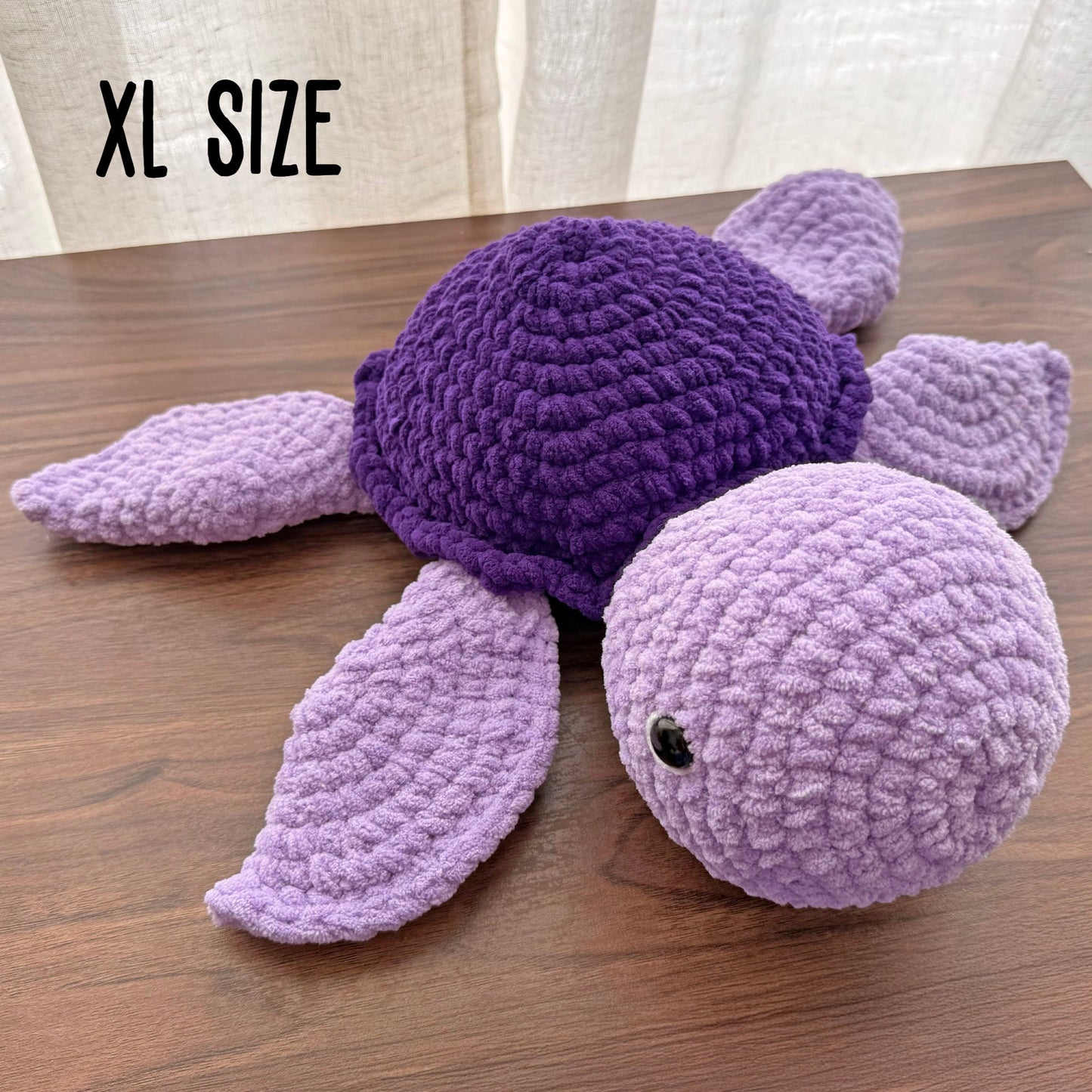 XL turtle plush with a purple shell and light purple body